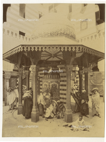 ARC-F-000218-0000 - Gazebo with people in Arab costumes photographed during carnival celebrations in the area of the Mercato Vecchio and the old Ghetto, Florence - Date of photography: 1886 - Alinari Archives, Florence