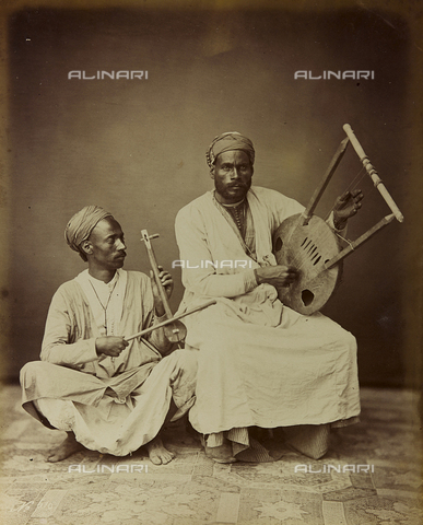 AVQ-A-001581-0033 - Album " Damas et Baalbek ": Pair of Syrian musicians photographed while playing a stringed instrument - Date of photography: 1880 ca. - Alinari Archives, Florence