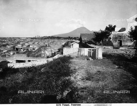 CGA-F-005170-0000 - General view of the excavations of Pompeii, with Vesuvius erupting in the background - Date of photography: 1890-1900 ca. - Alinari Archives, Florence