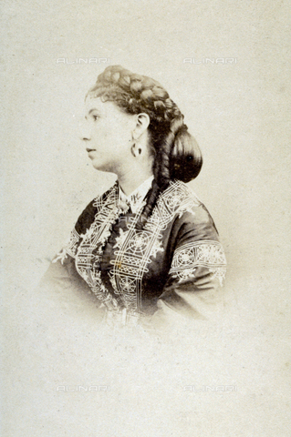 FBQ-A-006270-0196 - Half-length portrait of young woman. She is posing in profile showing an elaborate hairstyle - Date of photography: 1860 - 1870 ca. - Alinari Archives, Florence