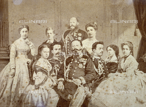 FBQ-F-001869-0000 - The picture portrays various members of the royal family of Savoy. At the center, seated, Victor Emmanuel II, Umberto I and Amedeo in full dress uniform; the daughters of the sovereign and Elisabetta of Saxony in elegant clothes. In the background, to the left, Maria Vittoria, Tommaso the young Duke Of Genoa, Prince Eugenio and Margherita the future Queen of Italy - Date of photography: 1860 - 1870 - Alinari Archives, Florence