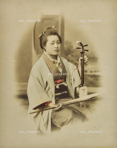 FVQ-F-040287-0000 - Young geisha with a kokyu, musical instrument arc - Date of photography: 1885-1895 - Alinari Archives, Florence