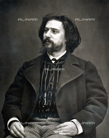 PDC-S-000442-0002 - The French writer Alphonse Daudet, sitting with his face in three quarter view. He is wearing day dress - Date of photography: 1869-1878 ca. - Alinari Archives, Florence