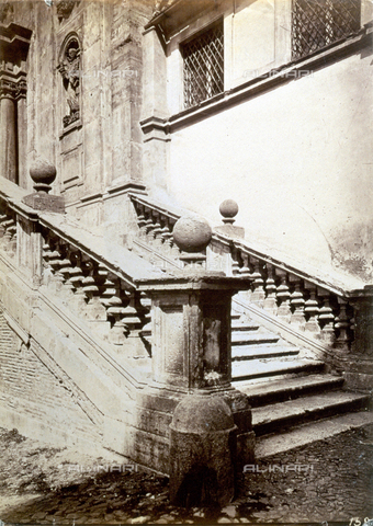 PDC-S-000461-0009 - Close-up of the staircase of the Church of SS. Domenico and Sisto in Rome. On either side balustrades decorated with spheres. In the background a statue of Saint Dominic, in a niche, can be glimpsed - Date of photography: 1870-1890 ca. - Alinari Archives, Florence