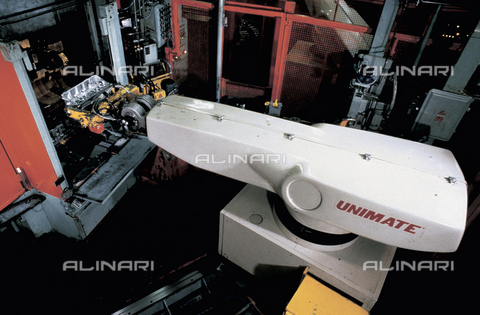 RCS-S-E18052-0001 - A robot in action on an automobile assembly line - Date of photography: 1984 - RCS/Alinari Archives Management, Florence