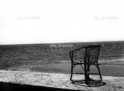 VZA-F-000255-0000 - View of the sea with a chair - Date of photography: 1950 ca. - Alinari Archives, Florence