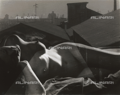 VZA-F-000378-0000 - Lying naked women having on her body an overlay of roof of an industrial city - Date of photography: 1950-1959 ca. - Alinari Archives, Florence